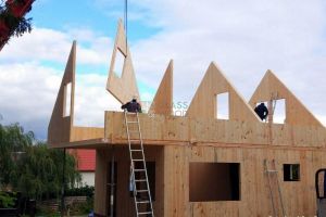 CLT glued wooden house assembly