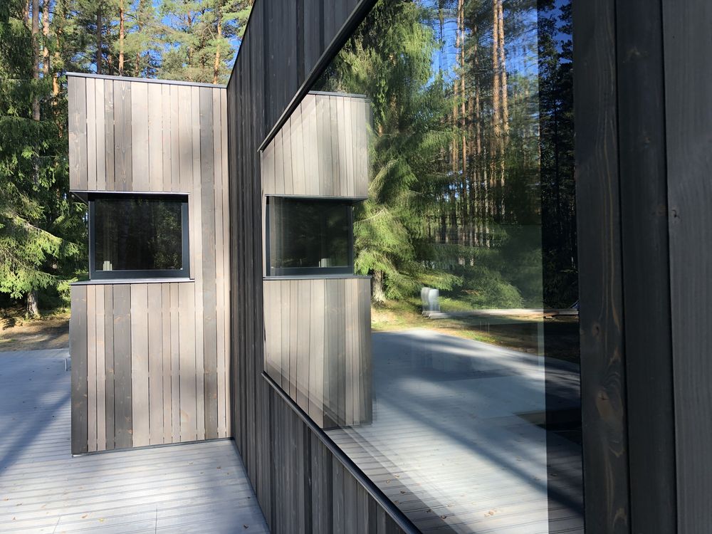 Panoramic glazing in one plane with the facade finish