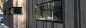 Panoramic windows in wooden house