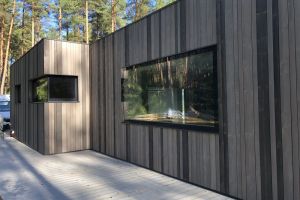 Panoramic windows in wooden house