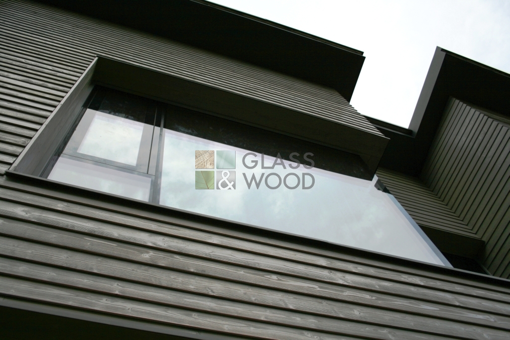 Wooden windows with structural glazing